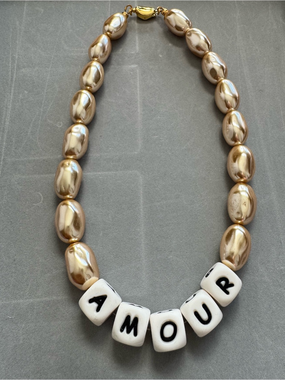 Gold Pearl Statement Necklace with 'AMOUR' Letter Beads
